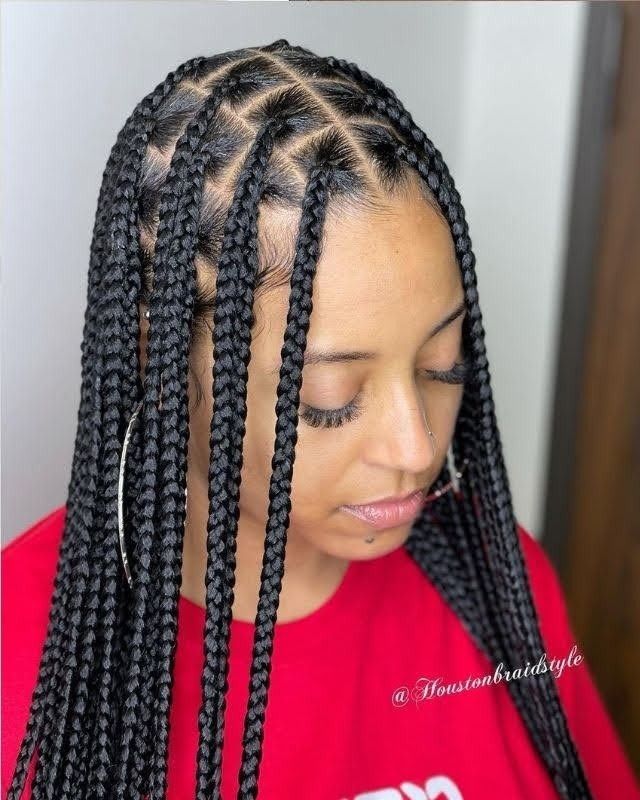 Medium box braids with side part