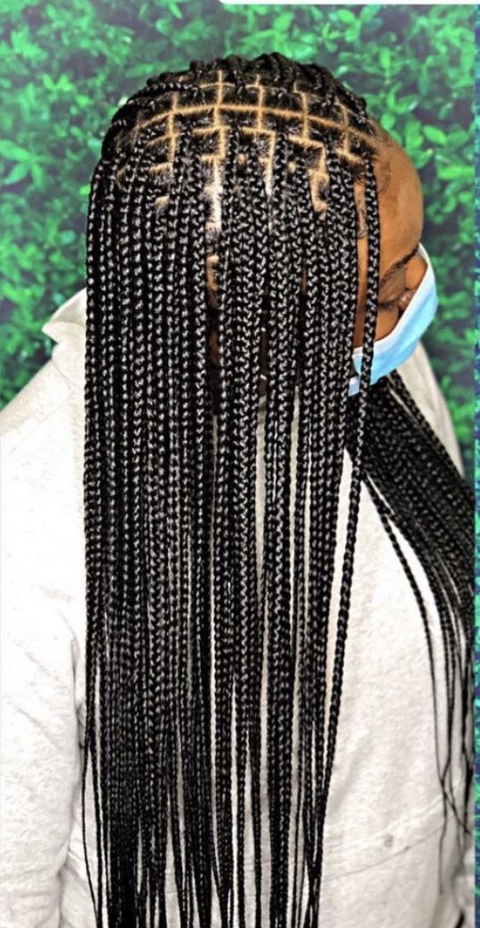 Knotless braids with intricate cornrow base pattern